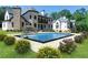 Back of house with a private backyard featuring a large pool, lounge chairs, and landscaped garden at 10745 Shallowford Rd, Roswell, GA 30075