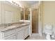 This bathroom features a double vanity and separate glass shower at 1303 N Druid Hills Ne Rd, Brookhaven, GA 30319