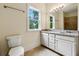 Bathroom features a double vanity and neutral colors at 1303 N Druid Hills Ne Rd, Brookhaven, GA 30319
