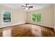 Spacious bedroom with hardwood floors and dual windows with views at 1303 N Druid Hills Ne Rd, Brookhaven, GA 30319