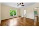 Bright bedroom with hardwood floors and an attached bathroom at 1303 N Druid Hills Ne Rd, Brookhaven, GA 30319