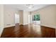 Bedroom featuring hardwood floors, ceiling fan, closet, and glass sliding doors to the backyard at 1303 N Druid Hills Ne Rd, Brookhaven, GA 30319