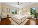 Bright bedroom with hardwood floors and natural light, offering a peaceful retreat with ample space and comfort at 1303 N Druid Hills Ne Rd, Brookhaven, GA 30319
