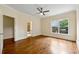 Bedroom features hardwood floors and access to the bathroom at 1303 N Druid Hills Ne Rd, Brookhaven, GA 30319