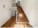 Inviting foyer with hardwood floors, a staircase, and ample natural light, creating a warm and welcoming entrance at 1303 N Druid Hills Ne Rd, Brookhaven, GA 30319