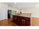 Kitchen island with granite countertops and stainless steel appliances at 1303 N Druid Hills Ne Rd, Brookhaven, GA 30319