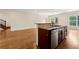 Kitchen island with granite countertops and stainless steel appliances at 1303 N Druid Hills Ne Rd, Brookhaven, GA 30319