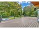 Spacious back patio overlooking the fenced yard and above ground pool at 1310 Dillon Rd, Austell, GA 30168