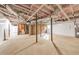 Unfinished basement, featuring concrete floors, insulated walls, and plumbing, awaiting personalization and finishing touches at 2419 Edgewater Sw Dr, Atlanta, GA 30311
