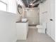 Bathroom featuring modern vanity and walk-in shower, complete with contemporary finishes at 2419 Edgewater Sw Dr, Atlanta, GA 30311