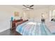 Bedroom boasts hardwood floors and natural light, plus a peek into the ensuite bathroom at 2419 Edgewater Sw Dr, Atlanta, GA 30311
