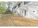 Spacious wooden deck with a modern railing, offers an inviting outdoor space for relaxation and socializing at 2419 Edgewater Sw Dr, Atlanta, GA 30311