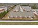 Aerial view of the community showing townhomes, backyards, and surrounding area at 453 Tara Commons Cir, Loganville, GA 30052