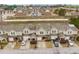 An aerial view of the community showing the townhomes with garages and parking at 453 Tara Commons Cir, Loganville, GA 30052