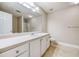 Full bathroom with a large mirror and white vanity with drawers at 453 Tara Commons Cir, Loganville, GA 30052