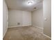 Bedroom featuring neutral carpet, walls, ceiling and one door at 453 Tara Commons Cir, Loganville, GA 30052