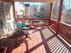 Open-air back porch area with patio furniture and outdoor seating at 929 Bexhill Dr, Lawrenceville, GA 30043