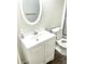 Bathroom features a shower with sliding glass door and white vanity at 929 Bexhill Dr, Lawrenceville, GA 30043