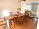 Well-lit dining room boasts hardwood floors and a decorative table with seating at 929 Bexhill Dr, Lawrenceville, GA 30043