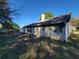 Spacious backyard showcasing the home's exterior with lawn at 983 Noble Oak Ct, Lawrenceville, GA 30046