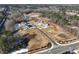 An aerial view shows new home construction on a wooded lot at 2722 Byess Ct, Marietta, GA 30064