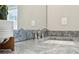 Modern bathroom with a granite countertop, silver faucet, and a white sink under a mirror and pot light at 3139 Stonegate Sw Dr, Atlanta, GA 30331