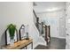 Inviting foyer with a staircase, hardwood floors, and decorative accents at 3139 Stonegate Sw Dr, Atlanta, GA 30331