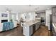 Spacious kitchen with a large island, stainless steel appliances, and an open view to the living room at 3139 Stonegate Sw Dr, Atlanta, GA 30331