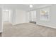 Spacious bedroom featuring plush carpet, natural light, and ample closet space at 10 Creek Se Dr, Cartersville, GA 30121