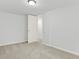 Cozy bedroom featuring neutral paint and carpet with white doors at 10 Creek Se Dr, Cartersville, GA 30121