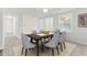 Elegant dining room with neutral-toned walls, contemporary lighting, and stylish seating for six at 10 Creek Se Dr, Cartersville, GA 30121