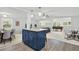 Kitchen island with granite countertops and dark blue cabinetry, offering ample space for cooking and entertaining at 10 Creek Se Dr, Cartersville, GA 30121