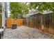 Private fenced-in backyard featuring gravel and an A/C unit at 241 Maynard Se Ter # 15, Atlanta, GA 30316