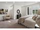 Calm bedroom featuring neutral tones, soft carpet, and a large window for ample natural light at 241 Maynard Se Ter # 15, Atlanta, GA 30316