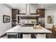 Kitchen with large island, stainless steel appliances, and dark cabinetry at 241 Maynard Se Ter # 15, Atlanta, GA 30316