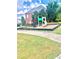 Community playground with play structure and green lawn at 3571 Parc Sw Cir, Atlanta, GA 30311