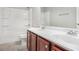 Bathroom featuring a double sink vanity, white countertop, and bathtub with shower at 4525 Hopewell Manor Dr, Cumming, GA 30028