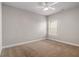 Bedroom featuring wall-to-wall carpeting, a window, and neutral decor at 4525 Hopewell Manor Dr, Cumming, GA 30028