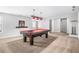 Carpeted game room with a pool table, pendant lighting, and neutral walls at 4525 Hopewell Manor Dr, Cumming, GA 30028