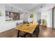 Bright dining room flowing into the kitchen with stainless steel appliances and a breakfast bar at 270 17Th Nw St # 2601, Atlanta, GA 30363