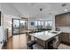 Modern kitchen with island, hardwood floors, and city views at 270 17Th Nw St # 2601, Atlanta, GA 30363