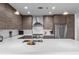 Well-appointed kitchen with stainless steel appliances and white backsplash at 270 17Th Nw St # 2601, Atlanta, GA 30363