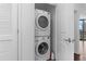 Stacked washer and dryer tucked into a closet, maximizing space and convenience at 270 17Th Nw St # 2601, Atlanta, GA 30363