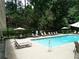 Outdoor pool with lounge chairs and umbrellas, perfect for relaxation at 3527 Essex Ave # 74, Atlanta, GA 30339