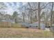 Large backyard enclosed by wood and chain link fencing at 403 Westchester Nw Blvd, Atlanta, GA 30314