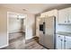 Modern kitchen features stainless steel appliances, granite counters and wood-look flooring at 403 Westchester Nw Blvd, Atlanta, GA 30314