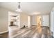 Spacious, bright living room with hardwood floors, with open view to white kitchen and bathroom at 403 Westchester Nw Blvd, Atlanta, GA 30314