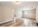 Bright, neutral living room featuring hardwood floors and doorways to other rooms at 403 Westchester Nw Blvd, Atlanta, GA 30314