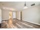 Large, bright living room showcasing hardwood floors, open to the bathroom and kitchen at 403 Westchester Nw Blvd, Atlanta, GA 30314