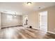 Bright, neutral living room featuring hardwood floors and doorways to other rooms at 403 Westchester Nw Blvd, Atlanta, GA 30314